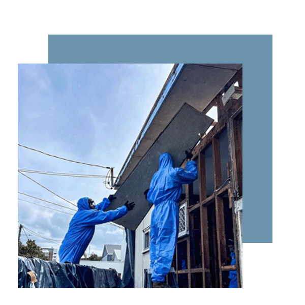 Asbestos removal team on roof